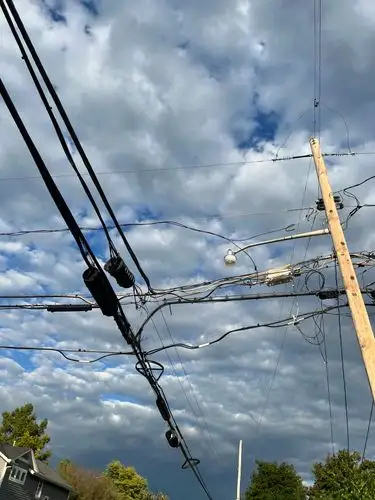 Urban sky tapestry of wires.